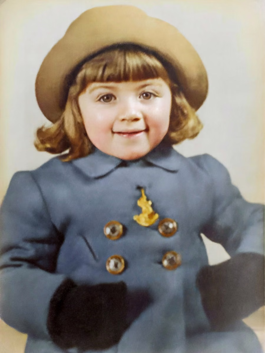 The same 1962 studio portrait of a young girl after hand-guided colourisation
