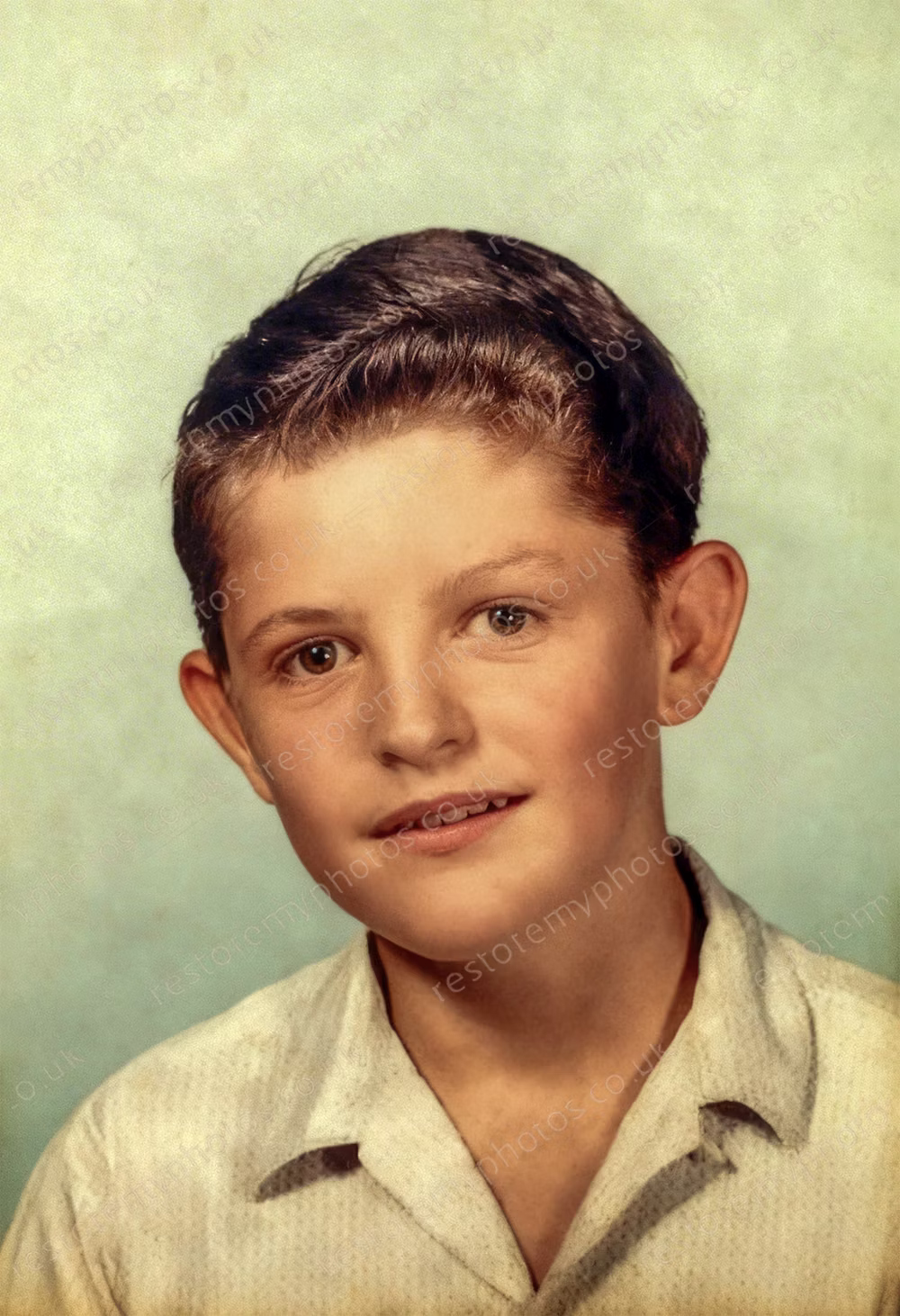 The same 1960s portrait after the tear across the face was repaired