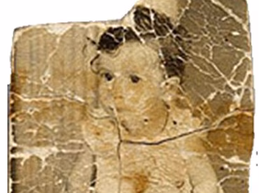 Damaged family photograph before restoration